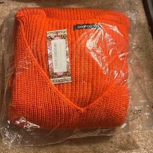 Orange oversized small/medium knit jumper.not worn, unopened in original package